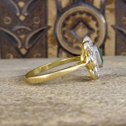 Contemporary 0.90ct Emerald and Diamond Cluster Ring