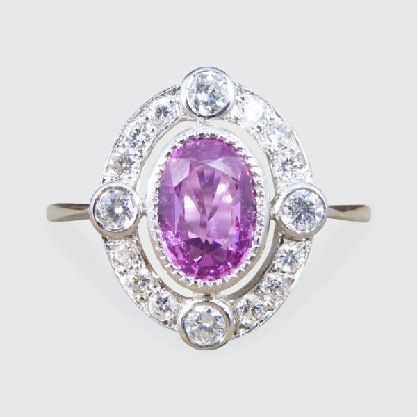 Contemporary 1.05ct Pink Sapphire and Diamond Halo Ring
