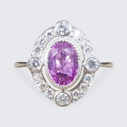 Contemporary 1.05ct Pink Sapphire and Diamond Halo Ring