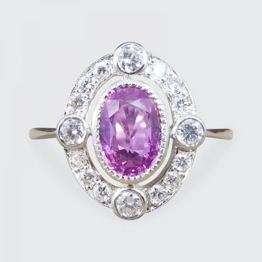 Contemporary 1.05ct Pink Sapphire and Diamond Halo Ring