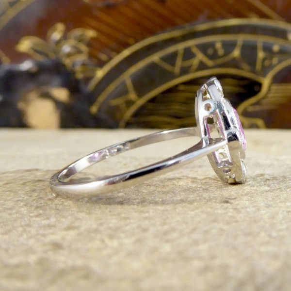 Contemporary 1.05ct Pink Sapphire and Diamond Halo Ring