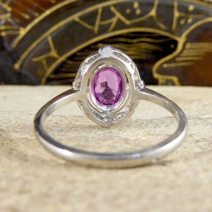 Contemporary 1.05ct Pink Sapphire and Diamond Halo Ring