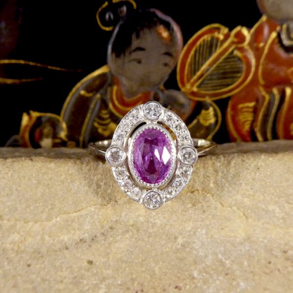 Contemporary 1.05ct Pink Sapphire and Diamond Halo Ring