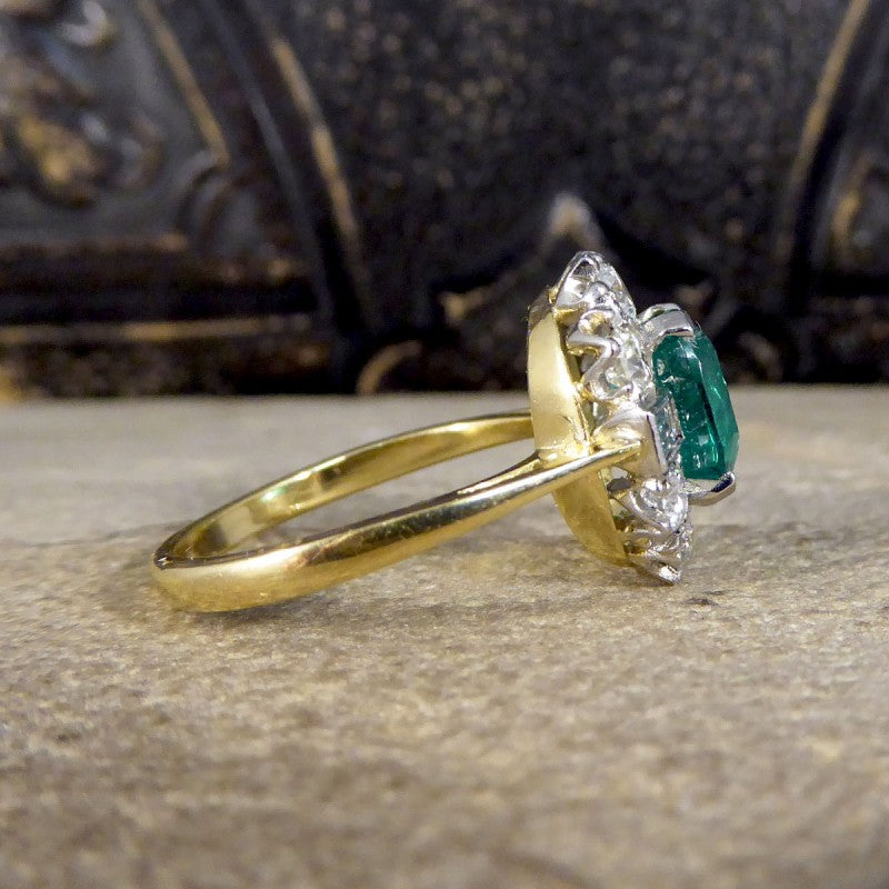 Contemporary 2.08ct Emerald and 1.25ct Diamond Cluster Ring