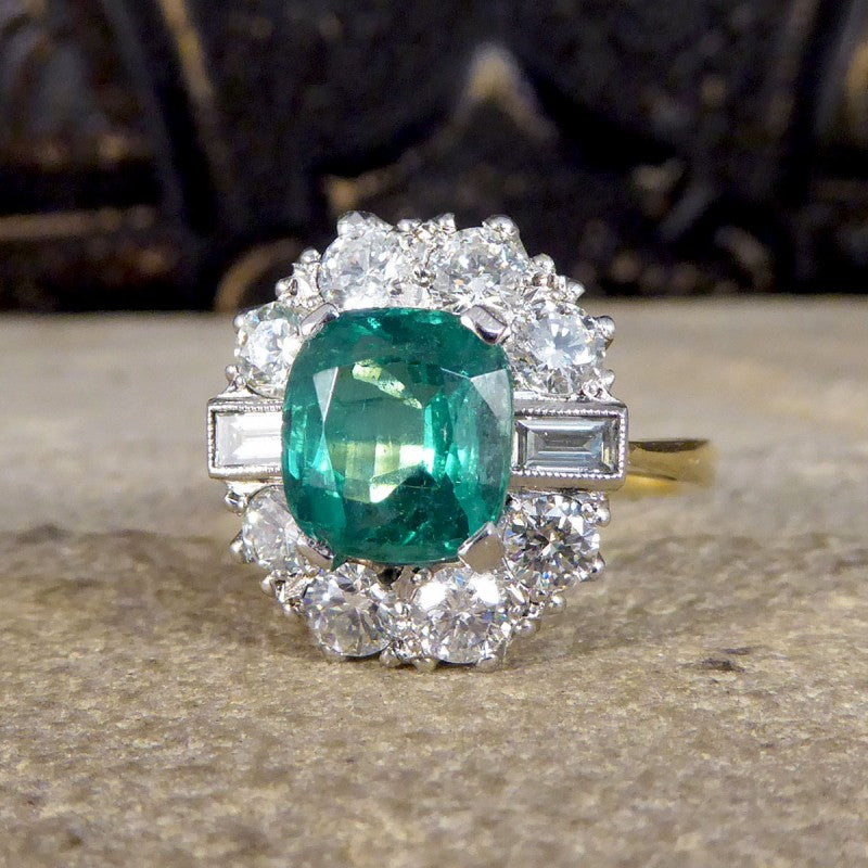 Contemporary 2.08ct Emerald and 1.25ct Diamond Cluster Ring