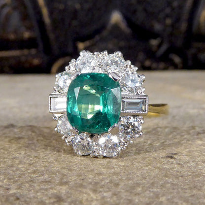Contemporary 2.08ct Emerald and 1.25ct Diamond Cluster Ring