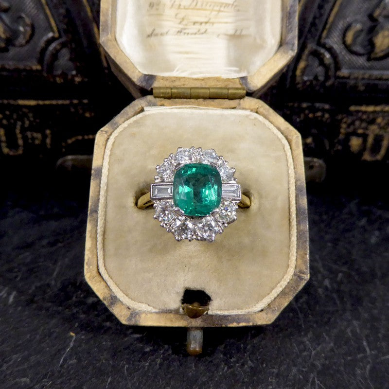 Contemporary 2.08ct Emerald and 1.25ct Diamond Cluster Ring