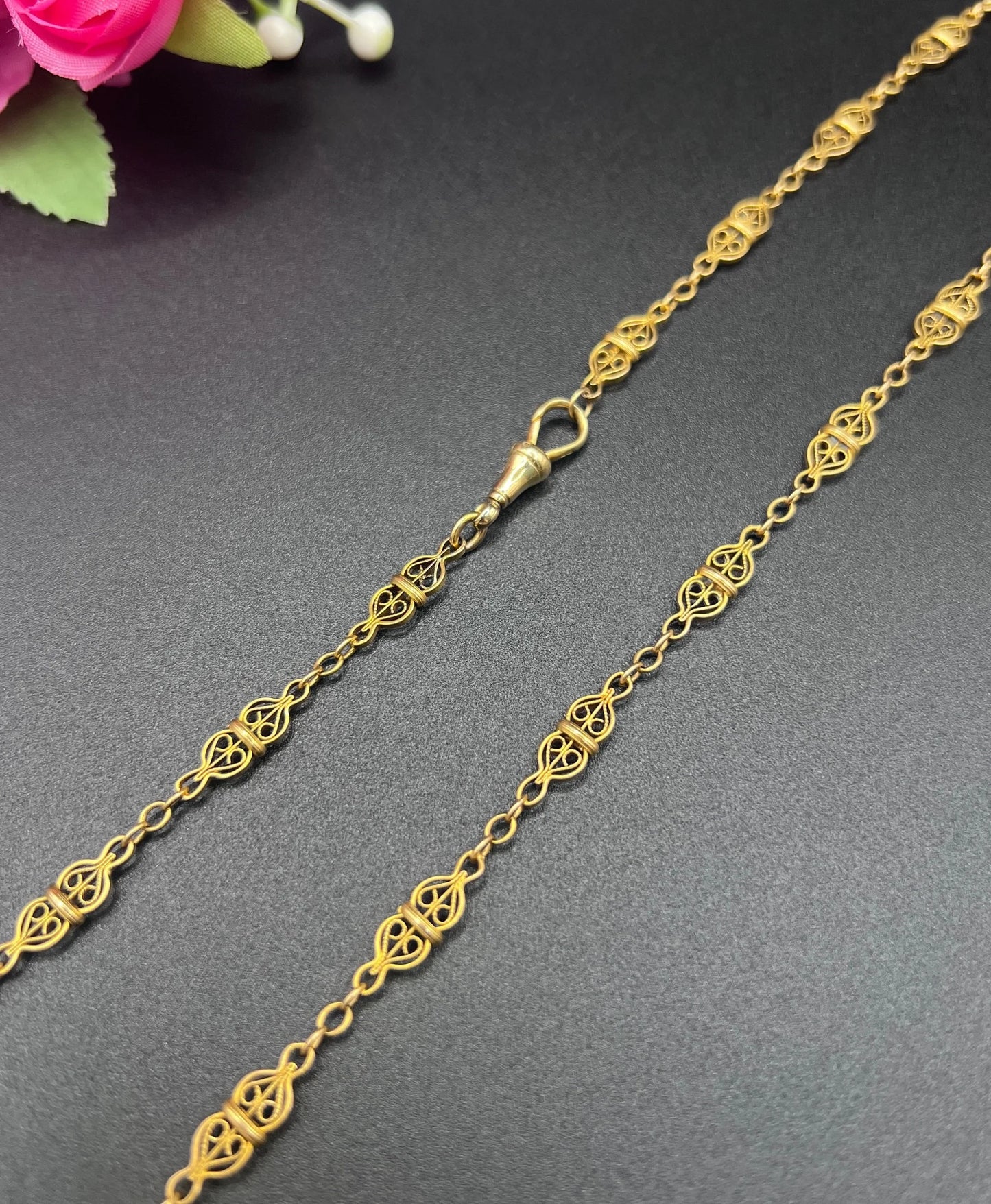 A yellow gold fancy link chain necklace