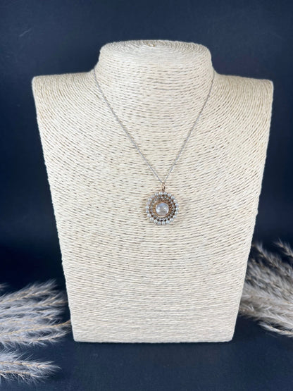 Antique 18 Carat Gold, Platinum, Moonstone, Diamond and Pearl Halo Pendant