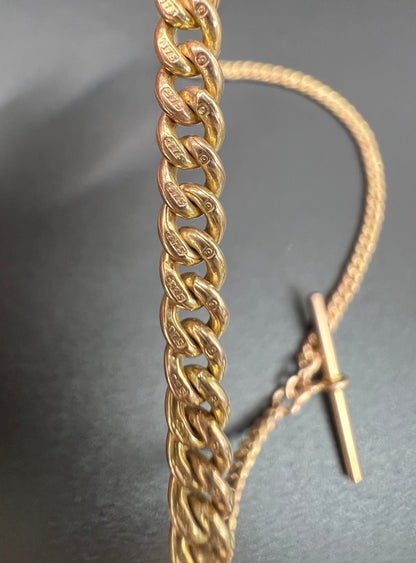 A yellow gold curb link Albert watch chain