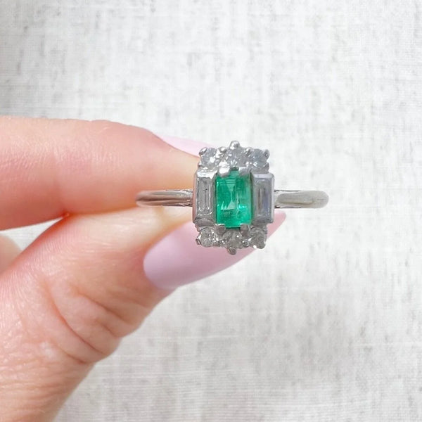 Vintage 18 Carat White Gold Emerald Cut Emerald and Diamond Cluster Ring, Circa 1940