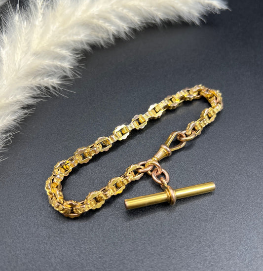 A yellow gold fancy link Albert bracelet