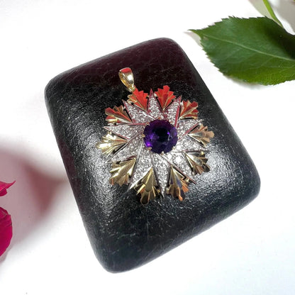 Vintage 1940 gold, diamond and amethyst star,  10-point star design with a faceted amethyst centre.  Pendant necklace 
