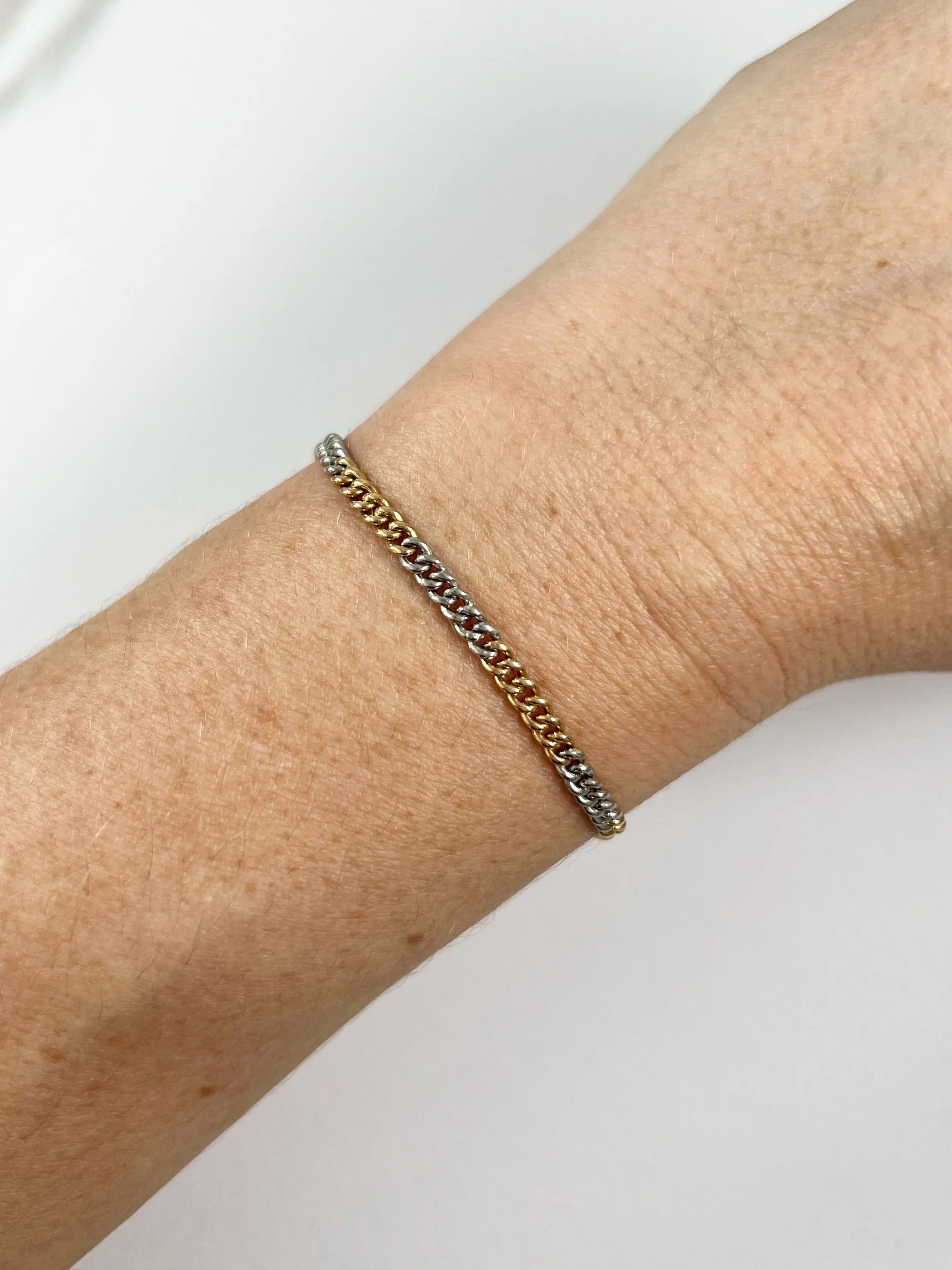 Antique 18 Carat Gold and Platinum Curb Link Bracelet with Swivel Clasp, Circa 1920