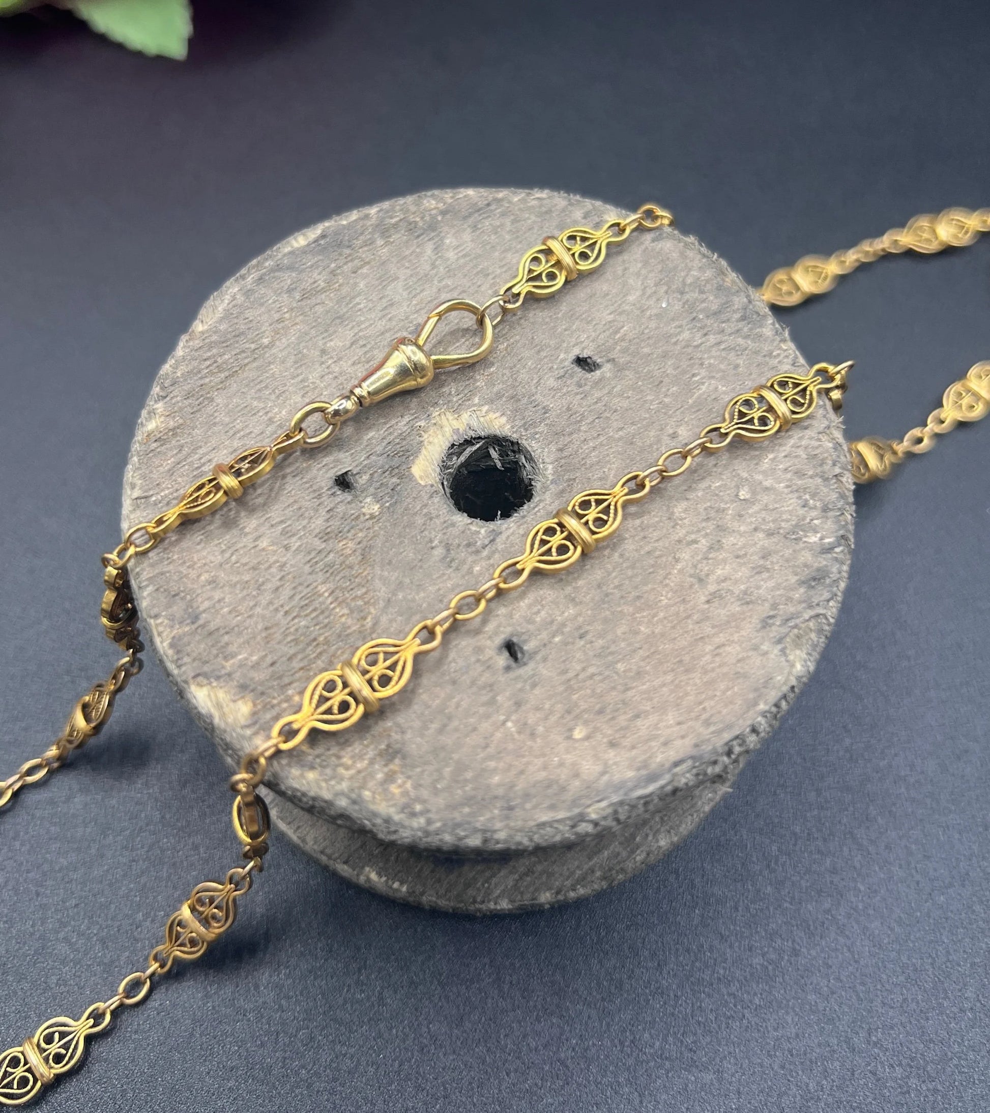 A yellow gold fancy link chain necklace