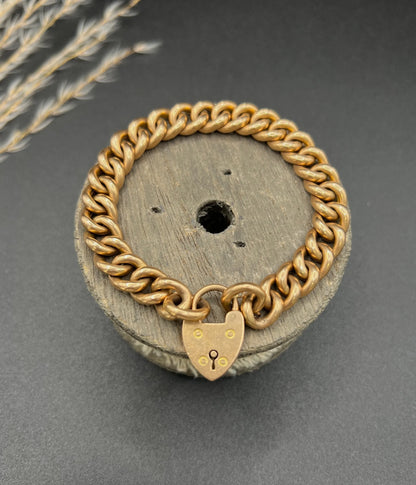 Victorian 15 Carat Rose Gold Curb Link Bracelet with Heart Padlock Clasp, Circa 1880