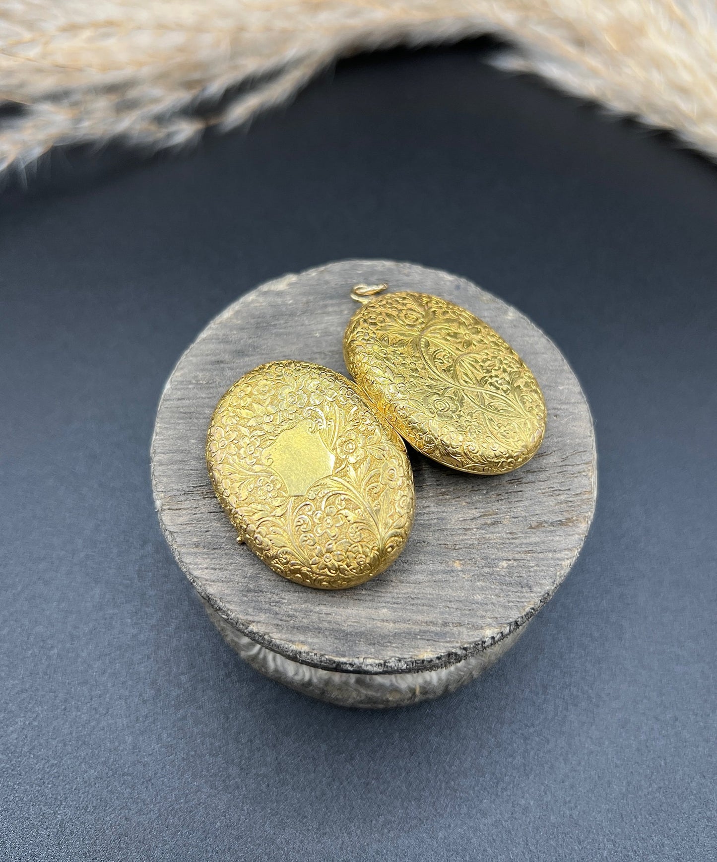 Victorian 18 Carat Yellow Gold Floral Engraved Oval Shaped Locket, Circa 1880