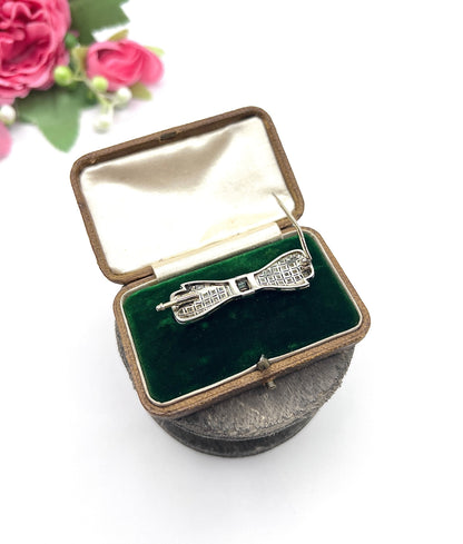 Art Deco 14 Carat White Gold Onyx and Diamond Bow Brooch, Circa 1920