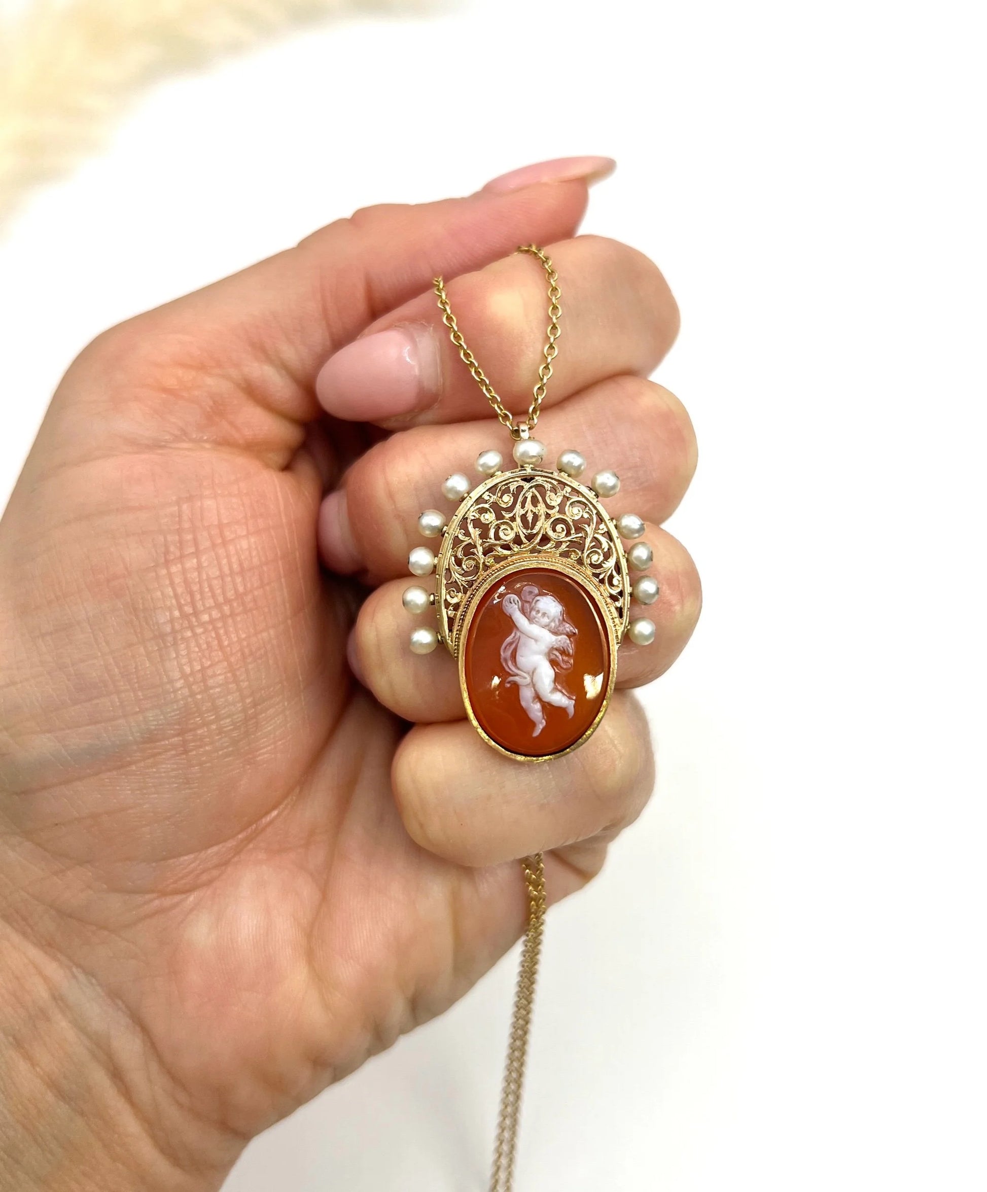 Antique 18 Carat Yellow Gold Hardstone and Natural Seed Pearl Cherub Cameo Pendant