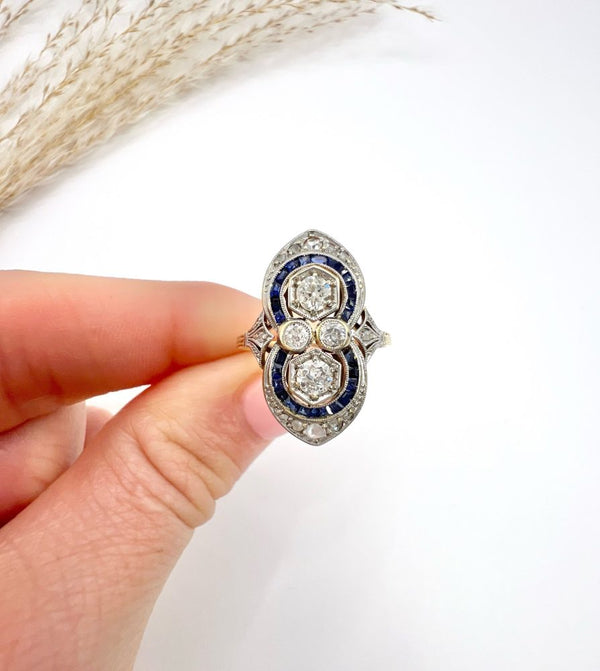 Art Deco diamond and sapphire ring in platinum and gold.
