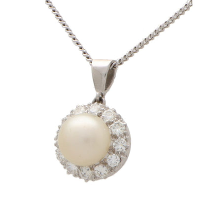 Diamond and pearl pendant necklace set in 9 carat white gold.
