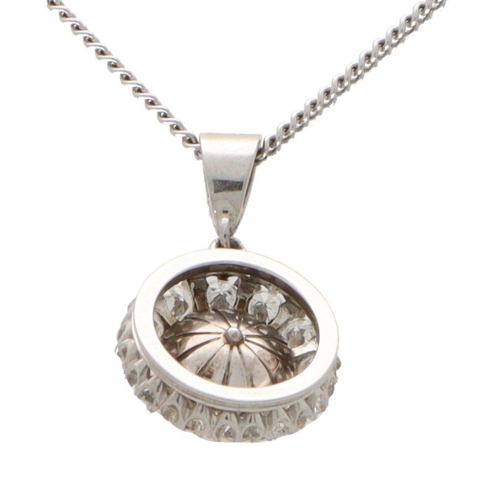Diamond and pearl pendant necklace set in 9 carat white gold.