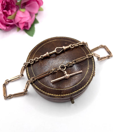 A rose gold fancy link Albert chain necklace