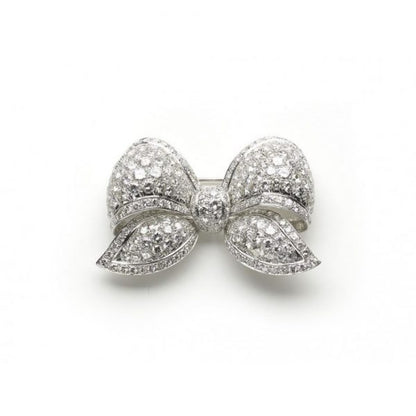 DIAMOND BOW BROOCH, 22 carats