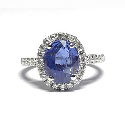 Sapphire engagement ring, with diamond surround cluster halo white gold