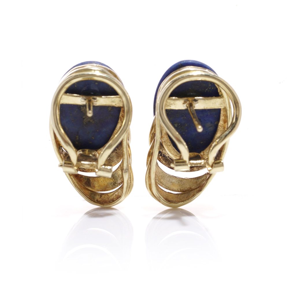 Vintage gold clip-on stud earrings with lapis lazuli stones.