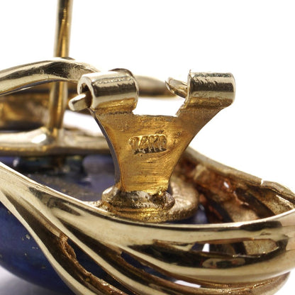 Vintage gold clip-on stud earrings with lapis lazuli stones.