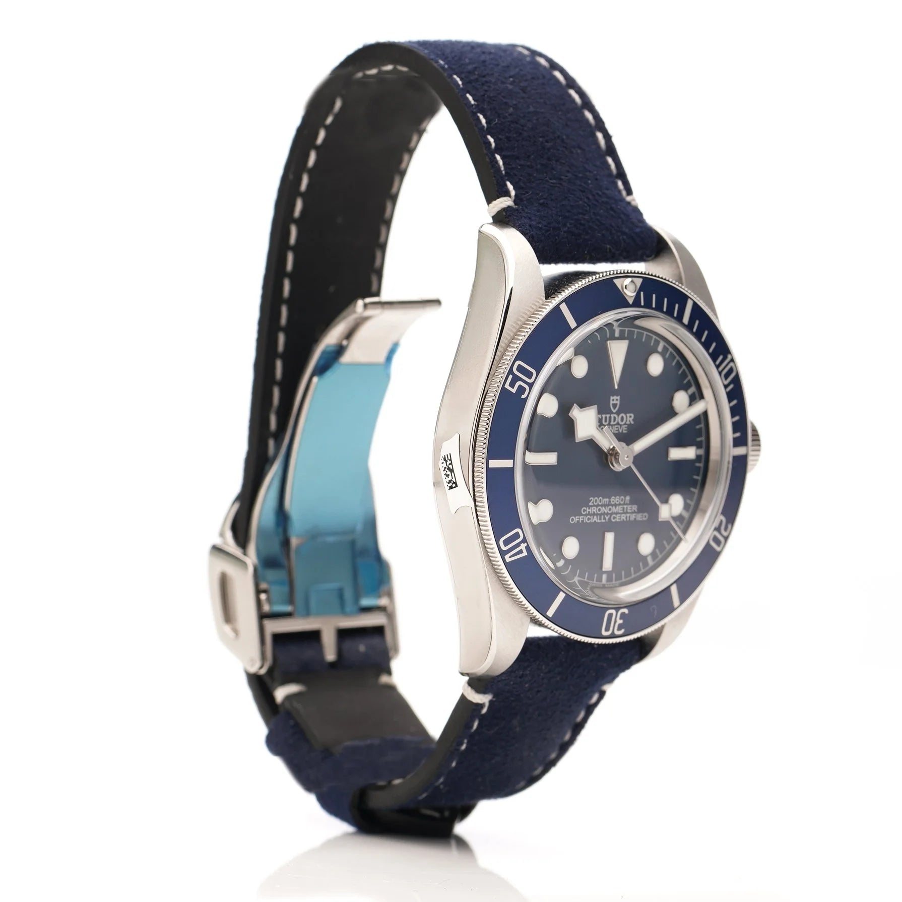 Tudor Geneve Chronometer wristwatch with navy blue dial, bezel and strap on a white background
