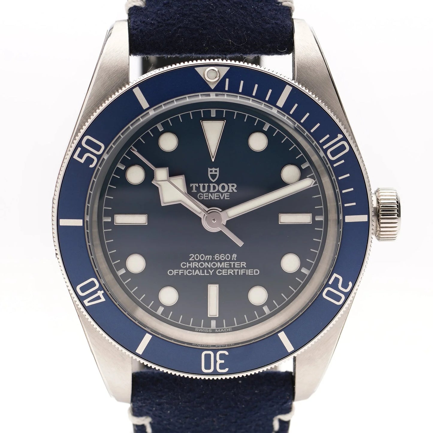 Tudor Geneve Chronometer wristwatch with navy blue dial, bezel and strap on a white background