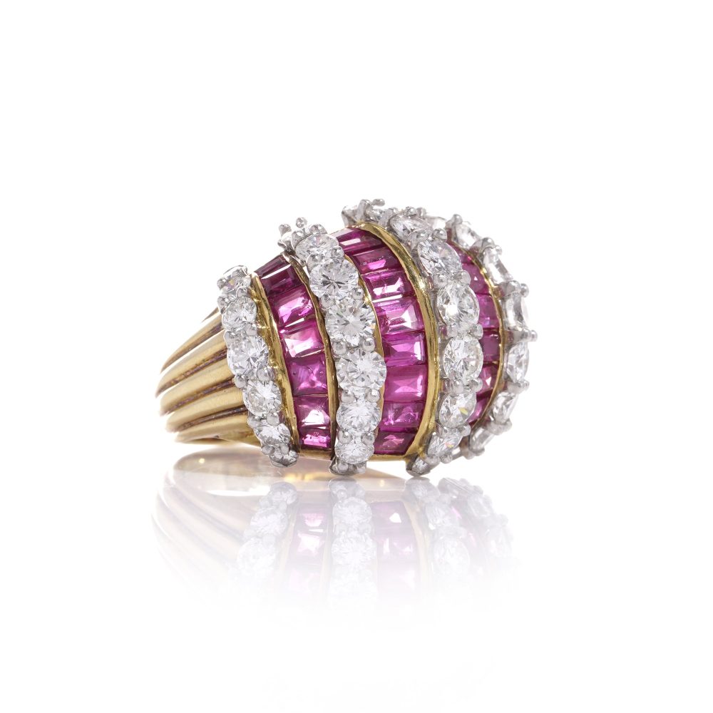 Vintage gold dome ring set with diamonds and rubies.