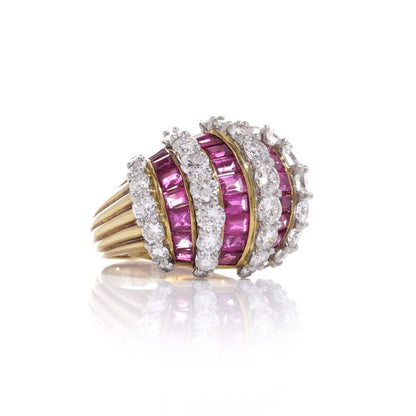 Vintage gold dome ring set with diamonds and rubies.