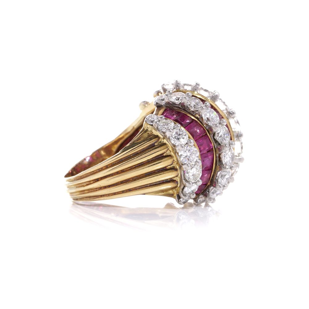 Vintage gold dome ring set with diamonds and rubies.