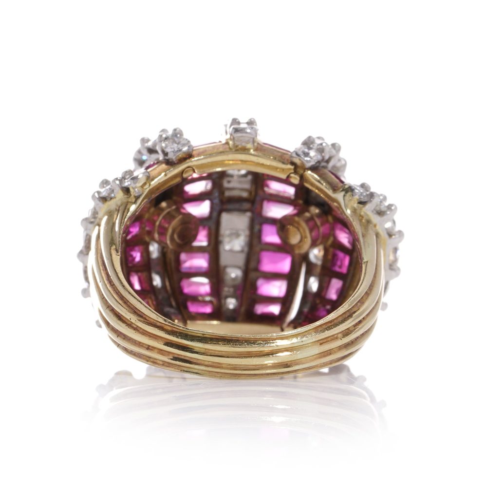 Vintage gold dome ring set with diamonds and rubies.