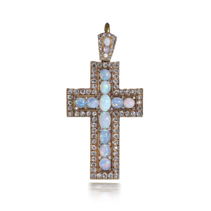 Antique 20 gold cross pendant set with diamonds and opals.