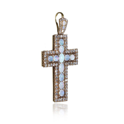 Antique 20 gold cross pendant set with diamonds and opals.