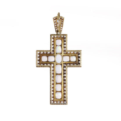 Antique 20 gold cross pendant set with diamonds and opals.