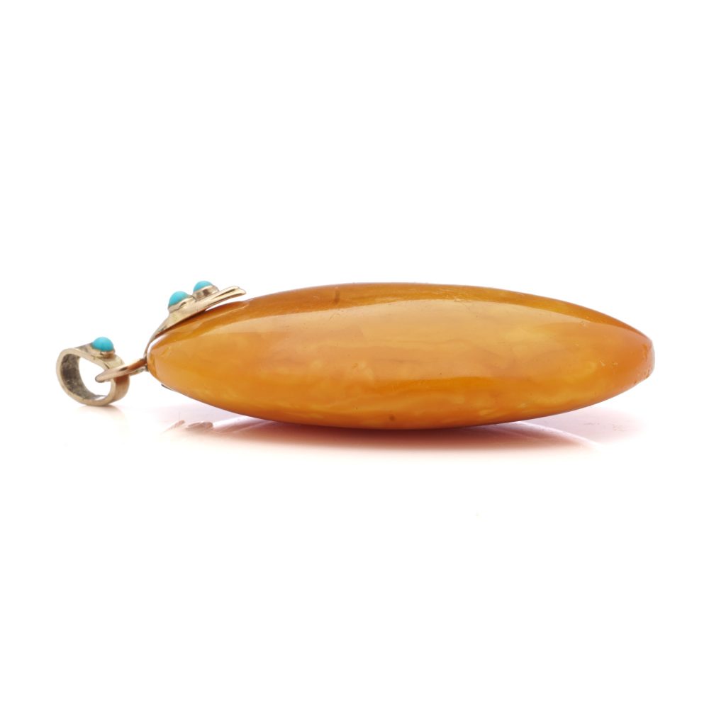 Vintage Amber pendant in rose gold with turquoise and diamond.