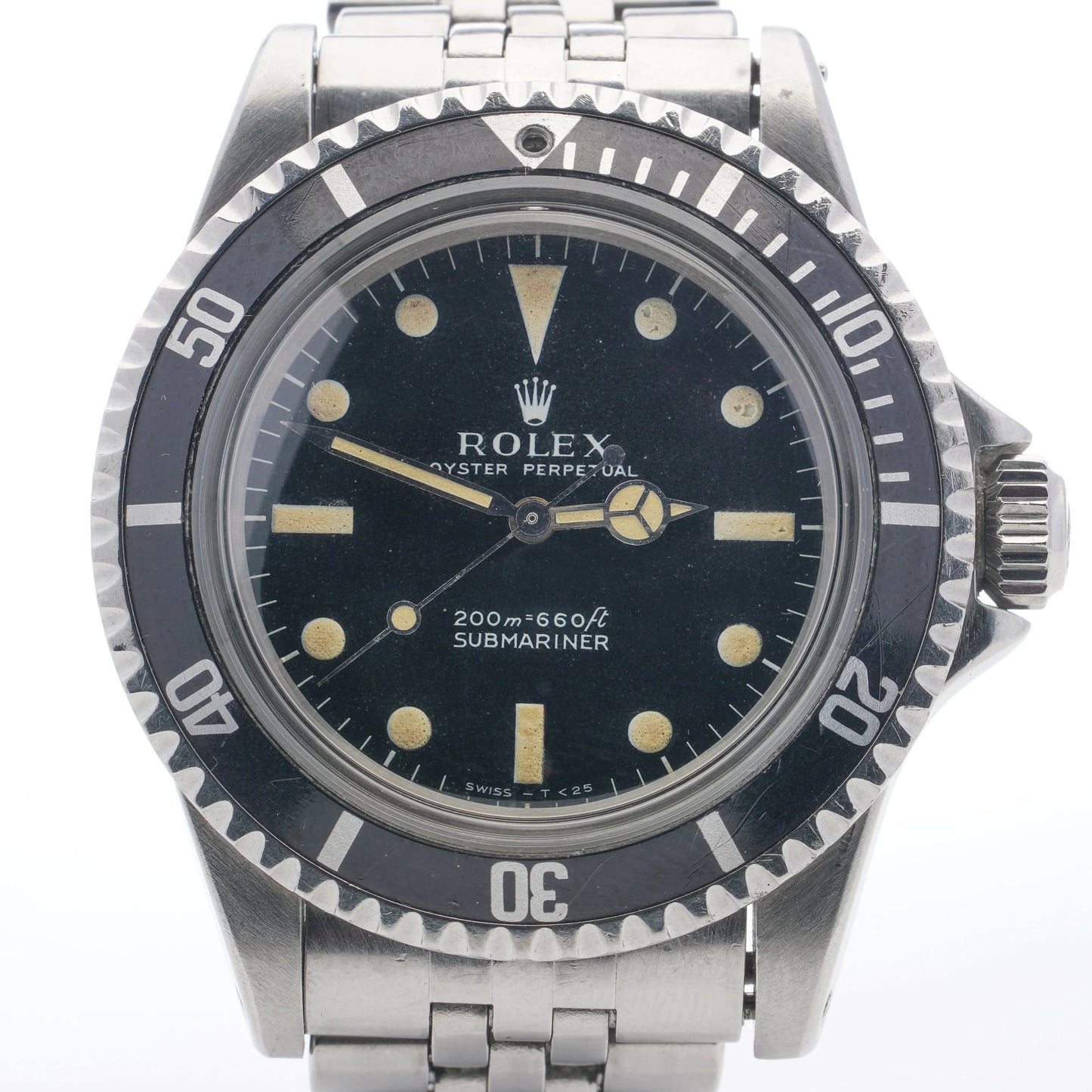A Rolex Submariner wristwatch in stainless steel with a black dial, on a white background