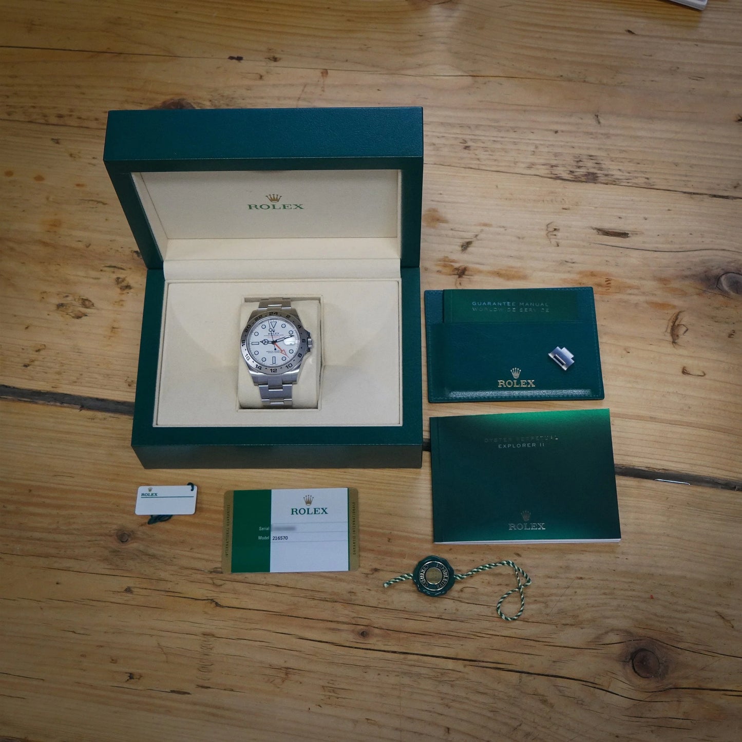 A Rolex Explorer II steel wristwatch with white dial, in a Rolex box with papers