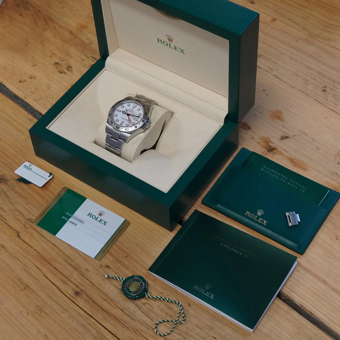 A Rolex Explorer II steel wristwatch with white dial, in a Rolex box with papers