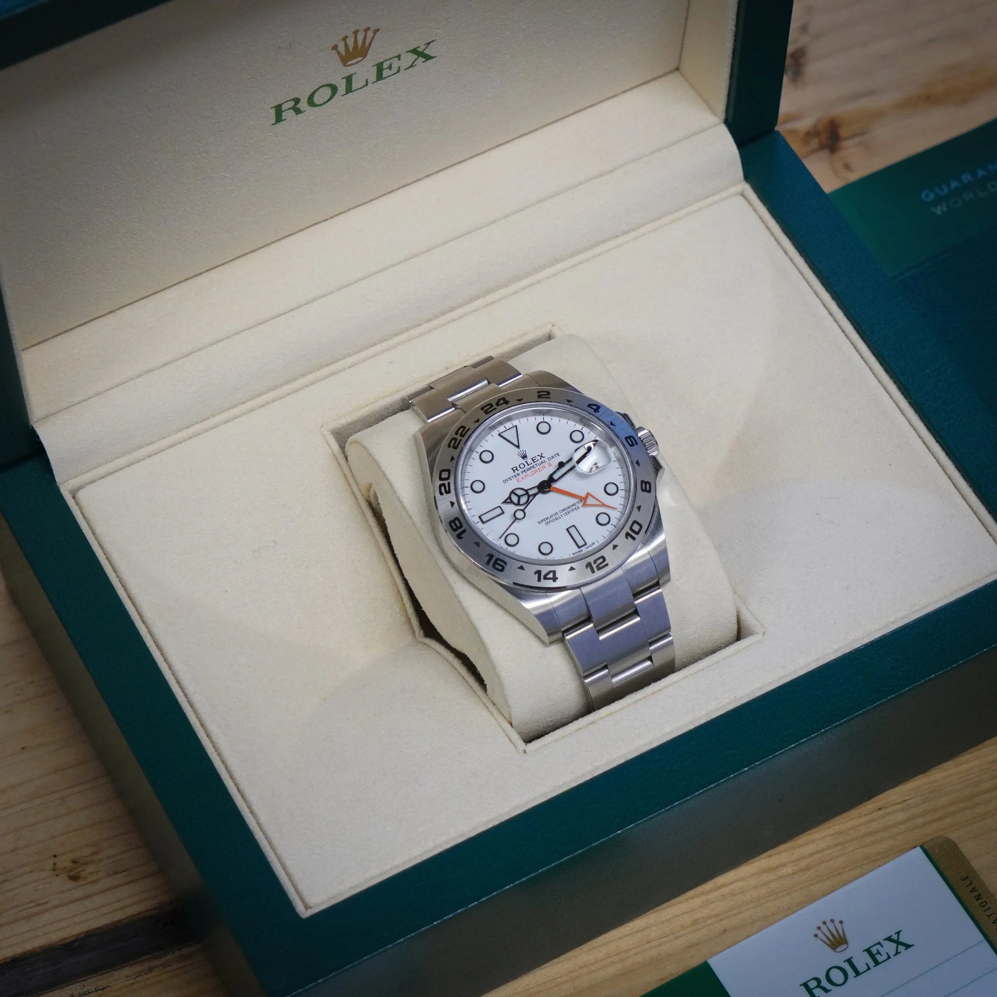 A Rolex Explorer II steel wristwatch with white dial, in a Rolex box