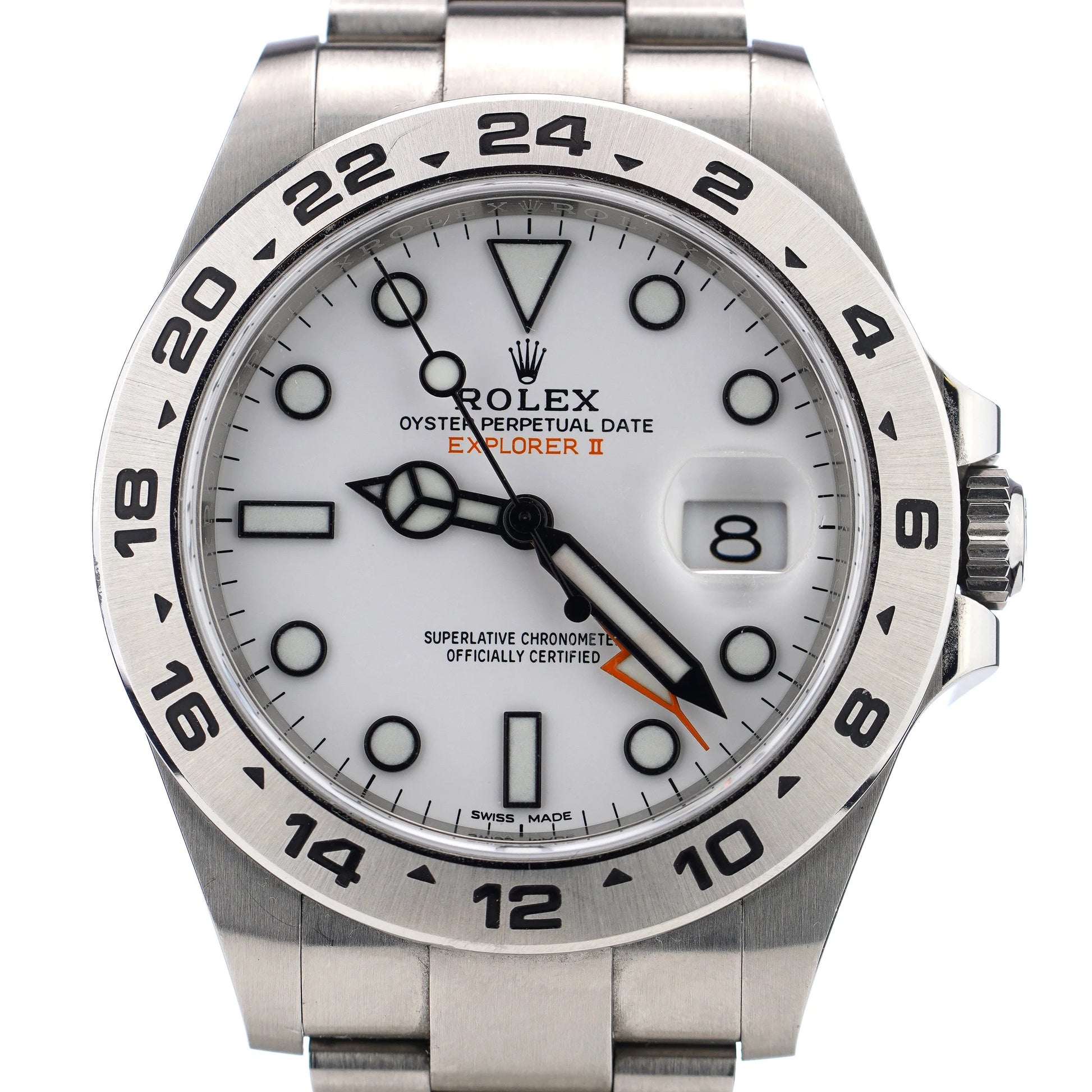 A Rolex Explorer II steel wristwatch with white dial, on a white background