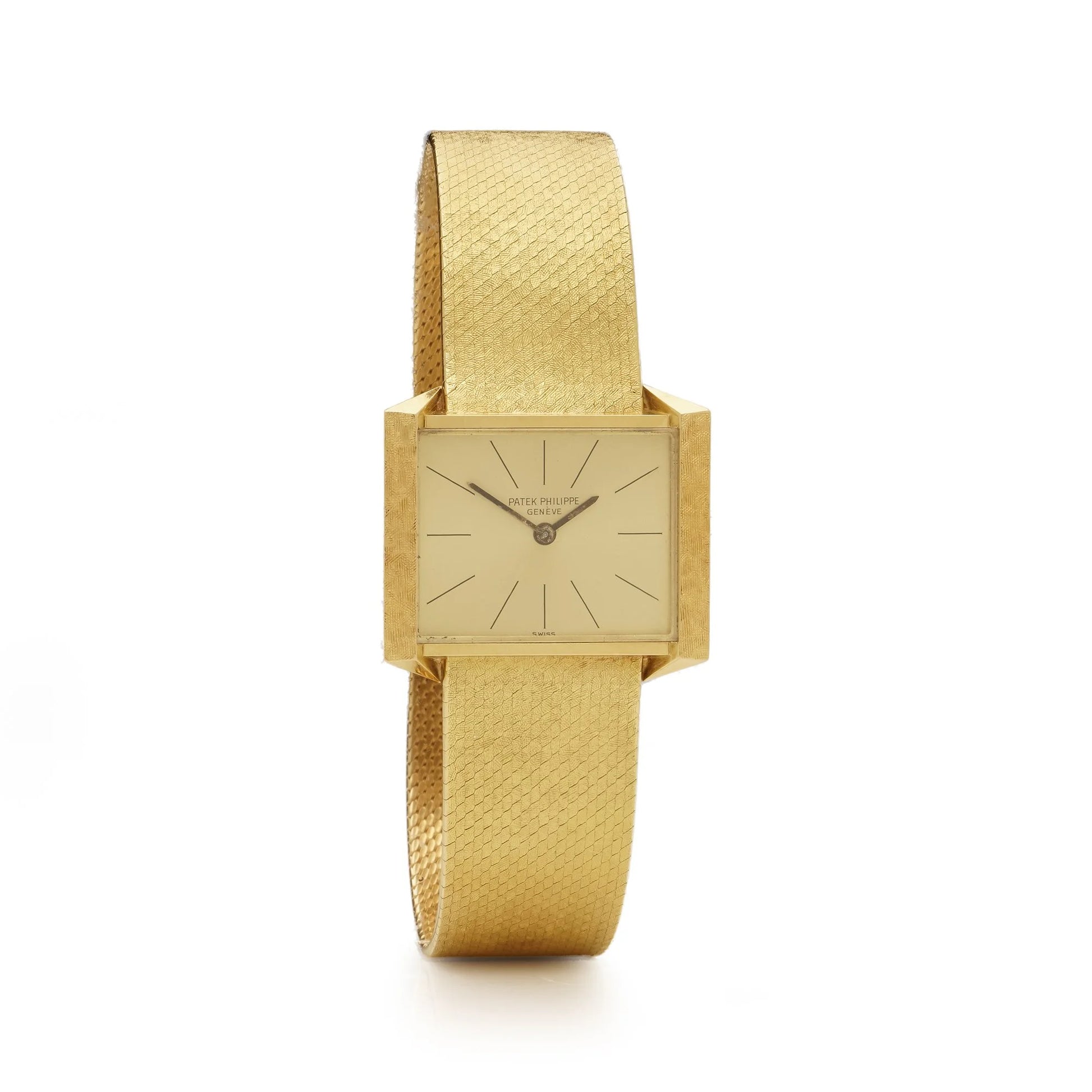 A yellow gold Patek Phillipe wristwatch with integrated bracelet, on a white background