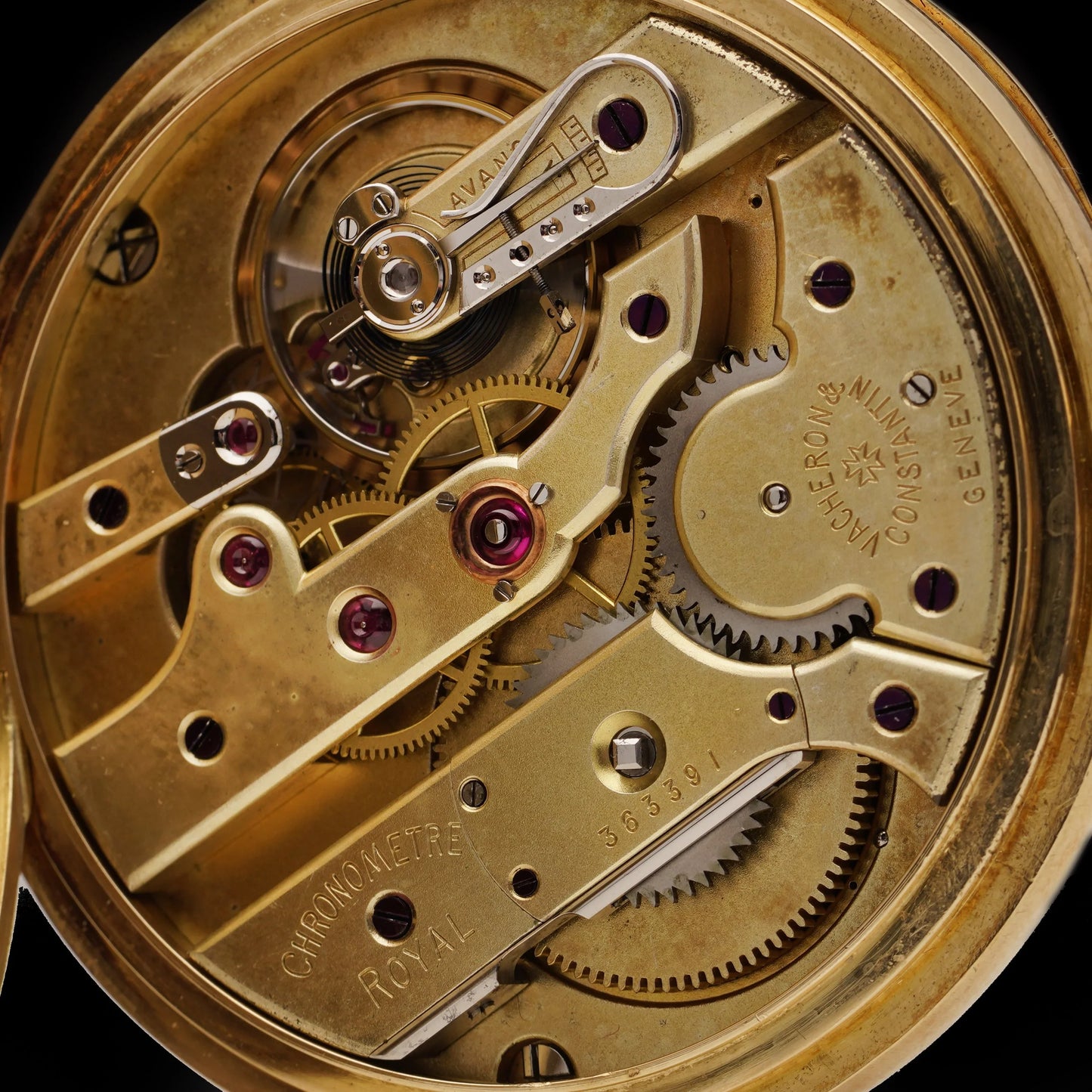 Close-up of a pocket watch movement in yellow gold, stamped Vacheron & Constantin Geneve and Chronometre Royal