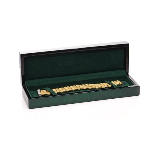 Woven design bracelet in white and yellow gold with diamonds and ruby,