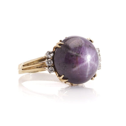 Vintage star ruby ring with diamonds in gold.